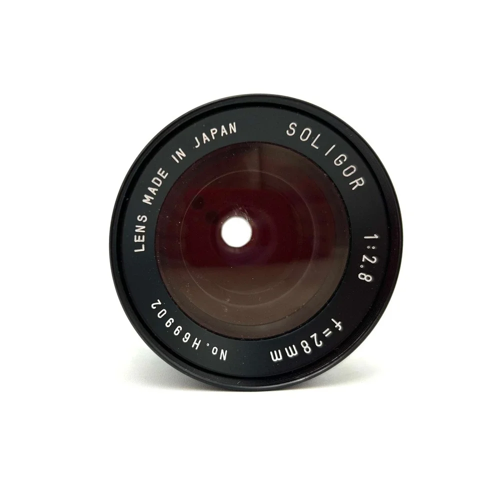 Soligor 28mm f2.8 Wide Angle Lens Japan H69902 with Braun Cap and Case
